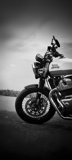 a black and white photo of a motorcycle