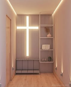 an empty room with a cross on the wall