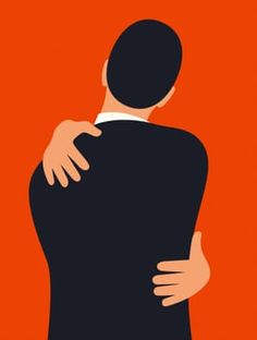 two people hugging each other in front of an orange background