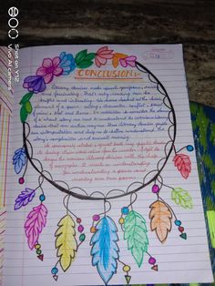 an open notebook with writing on it and colorful leaves around the page that says conclusion