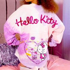 Hello Kitty Sanrio Japan La Spirit Jersey Size Small Oversized Fit, Long Sleeve Tshirt, Spirit Jersey Style Japan La X Sanrio X Spirit Jersey Collab Pink, Purple, And White Tye-Dye Spirit Jersey Featuring Hello Kitty, Boba Tea, Hearts And Glitter Like New Condition, Worn Once, Washed Inside Out In Cold Water And Hung To Dry. No Flaws, Stains, Snags, Holes, Discolorations, Or Cracking In The Lettering That I Can See. First Photo Taken From Japan La Website/Ig Sold Out Online Purple Cotton Kawaii Top, Purple Cartoon Print Tops For Spring, Purple Letter Print Tops For Loungewear, Oversized Pink Top With Cartoon Print, Purple Harajuku Crew Neck Top, Playful Purple Tops With Cartoon Print, Cute Purple Top With Letter Print, Purple Harajuku Cotton Top, Purple Cotton Harajuku Top