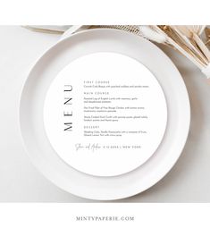 a white plate with the words menu on it