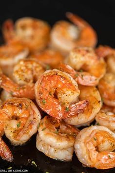 cooked shrimp with herbs and seasoning in a skillet, ready to be eaten