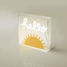 a clear acrylic box with the word hello on it