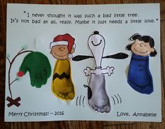 a christmas card with three children's handprints