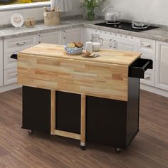 a kitchen island made out of wood and metal with two trays on the top