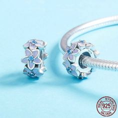 European 925 Sterling Silver Darling Daisies Spacer Charm pandora bead Item specifics    Fine or Fashion: Fashion    Item Type: Charms    Metals Type: Silver    Style: Casual/Sporty    Material: Metal    is_customized: Yes    Model Number: C601    Charms Type: Flowers    Material: 925 Sterling Silver + Cubic Zirconia    Name: Darling Daisies Spacer    Promise: 100% 925 Sterling Silver ,If no , 100% refund    Gift for: Mom, Wife, Girlfriend, Daughter, Yourself------------------------------------S Silver Beaded Flower Jewelry, Silver Beaded Bracelets With Flower Charm As Gift, Sterling Silver Spacer Beads For Jewelry Making, Silver Flower Jewelry With Spacer Beads, Sterling Silver Jewelry With Spacer Beads, White Sterling Silver Jewelry With Spacer Beads, Beads Charm, Pandora Beads, Pandora Bracelet Charms