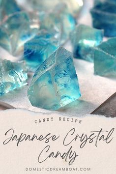 some blue crystals on top of paper with the words japanese crystal candy written below it