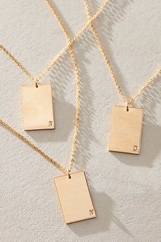 So unique in an understated design, this stunning necklace features a personalized rectangle pendant with initial engraved at corner for a super fun finishing touch. * 14k Gold Filled * 0.5x0.75" rectangle bar necklace with hand-stamped personalization * Length: 20" * 5 days of production | Set & Stones Personalized ie Necklace at Free People in Gold Rectangle Pendant, Accessories Jewelry Necklace, Stunning Necklace, Bar Necklace, Boho Clothing, Boho Outfits, Hand Stamped, Gold Filled, Jewelry Accessories