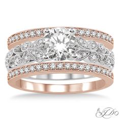 two tone gold engagement ring set with diamond accents and leaves on the band, featuring a round