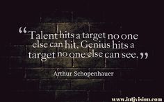 a brick wall with a quote on it that reads, talent hits a target no one else hit genius hits a target none else can see