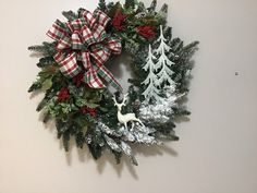 a christmas wreath hanging on the wall