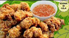 fried food on a plate with dipping sauce