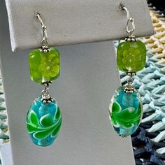 Beautiful Handblown Glass Bead Earrings. Handcrafted With Vintage Beads. Sterling Silver. Pierced. Every Bead Is Unique And May Differ Slightly In Design And Size. Gorgeous Details In Beads. Nwot Bundle And Save On Shipping Glass Beaded Earrings With Dangling Beads, Elegant Green Beaded Earrings For Beach, Green Czech Glass Earrings With Colorful Beads, Green Glass Beaded Dangle Earrings, Givenchy Earrings, Citrine Earrings Studs, Rhinestone Costumes, Glass Bead Earrings, Face Earrings