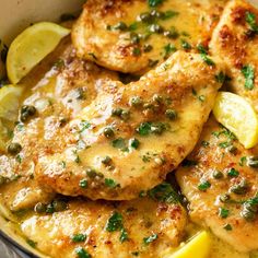 chicken with lemon and capers in a skillet