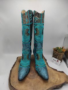 Hi, These are handmade genuine leather custom made cowboy style women's boots. Made with naturel leather, chenille fabric, ykk zipper. There is every size is available, 6 us to 11 us, 36 eu to 43 eu. There is heel 1 inches, 2.5 cm. ** If you need wider calf pleasse send us your calf circle measurments. To make custom order no extra charging. Boots height is knee high. There is ethnic pattern on turquoise boots. Waterproof. Very comfy and useful. We have door to door express shipping service. İf Bohemian Pointed Toe Boots For Festivals, Fitted Bohemian Boots With Pointed Toe, Bohemian Festival Boots With Pointed Toe, Bohemian Pointed Toe Festival Boots, Western Style Blue Festival Boots, Blue Western Style Festival Boots, Blue Bohemian Festival Boots, Blue Western Festival Boots, Western Multicolor Leather Boots