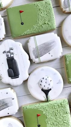 decorated cookies with golf themed icing on top of white plates and green napkins