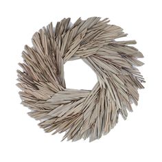 a wreath made out of sticks on a white background