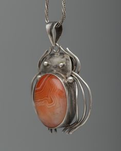 Orange Sardonyx Pendant Disclaimer: Please note that the locket you've ordered does not include the chain/necklace. However, we have some special chain/necklace available to complement your locket perfectly. If you're interested in our chain/necklace options, please don't hesitate to send us a message for more details. Thank you for choosing us!About our locket Presenting our exquisite Orange Sardonyx Pendant, which is expertly made on pure silver and features a lovely oval-shaped sardonyx stone Silver Carnelian Pendant Necklace, Handmade Symbolic Jewelry With Oval Pendant, Unique Pendant Locket Jewelry, Silver Carnelian Cabochon Jewelry, Silver Carnelian Necklace With Large Pendant, Unique Round Pendant Locket Jewelry, Collectible Locket Pendant Necklace, Gift Cabochon Metal Necklace, Carnelian Cabochon Pendant Jewelry