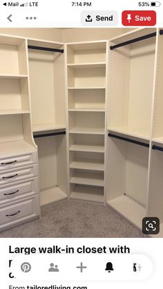 an empty walk in closet with white shelves and drawers