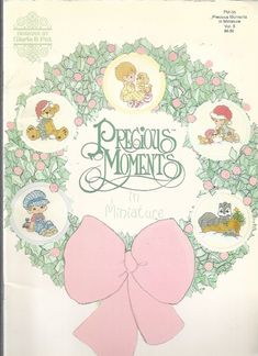 an old children's book with pictures of teddy bears and wreaths on it