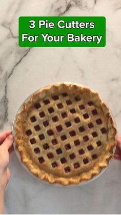 a person holding a pie on top of a marble counter with the words 3 pie cutters for your bakery