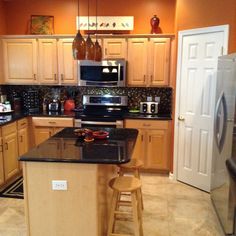 the kitchen is clean and ready for us to use it's granite counter tops