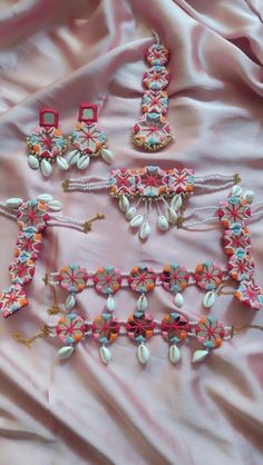 handmade bridal jewellery Bohemian Multicolor Sets With Gota Work, Bohemian Kundan Sets For Festive Season, Traditional Pink Jewelry With Dori Work, Multicolor Gota Work Sets For Wedding, Multicolor Handwork Jewelry For Diwali, Multicolor Jewelry Sets For Wedding And Navratri, Handmade Kundan Sets For Festive Occasions, Festive Multicolor Handwork Jewelry, White Meenakari Party Sets