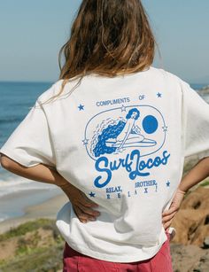 Vintage Beach Shirt, Surf Shirts Graphic Tees, Vintage Surf Tee, Surf Outfit Women, Surf Branding, Alpha Gym, Merch Photoshoot, Summer Graphic Tees, Wayward Daughters