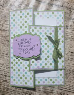 a card with polka dots and a green ribbon on the front, says for a special person in my special day