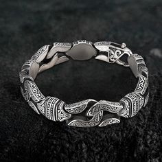 Celtic Wolf Stainelss Steel Beast Viking Bracelet - Stainless Steel - Silver – GTHIC Elegant Geometric Bracelets Gift, Elegant Geometric Bracelets For Gifts, Elegant Geometric Bracelets For Gift, Vintage Stainless Steel Jubilee Bracelet, Modern Metal Bracelets With Engraving, Modern Engraved Metal Bracelets, Elegant Adjustable Geometric Bracelet, Vintage Stainless Steel Bracelet Jewelry, Vintage Stainless Steel Bracelet