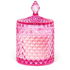 a pink glass jar with a diamond design on the lid and bottom is shown in front of a white background