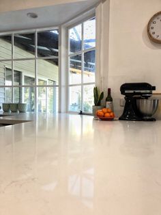 the kitchen counter is clean and ready to be used for breakfast or desserts, as well as oranges