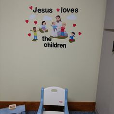 a child's room with a wall sticker that says jesus loves the children