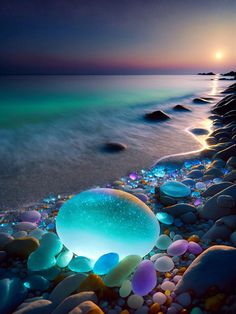 an image of a beach scene with rocks and pebbles on the shore at night time