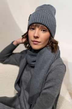 Finish off your fall or winter outfit with a Merino wool beany hat and scarf set. Made of extra fine wool, these cold weather accessories will keep you toasty and stylish. Pair them with an elegant wool coat or a puffer jacket and enjoy the luxurious softness that no-one can resist. MONALA Monala is an ethical clothing brand making unique handmade knitwear perfectly suitable for a woman aiming to build and maintain her wardrobe minimalist, basic, and versatile. STYLE - Unisex - Ribbed pattern - Casual Wool Ribbed Beanie, Casual Ribbed Wool Beanie, Ribbed Beanie For Cold Weather In Fall, Gray Knit Winter Hat, Cold Weather Solid Knitted Beanie, Warm Snug Beanie For Fall, Ribbed Wool Beanie For Fall, Fall Wool Ribbed Beanie, Cozy Ribbed Beanie For Cold Weather