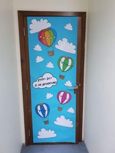 a door decorated with hot air balloons and the words, every day is an adventure