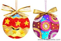 two christmas ornaments with bows on them