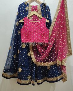 Lehenga blue with pink blouse for women.  * Plus size available at a small up-charge. * Size: This is custom made outfit as per your size. Post your order we will send you a measurements reference sheet using which you can provide details required to make your outfit with best fit. * Fabric and work: Lehenga - Embroidered Net fabric. Blouse - Heavy embroidered sequences net fabric. Dupatta - Dupatta is in net with embroidery lace border on all sides of it. Dupatta is decorated with beautiful seq Pink Semi-stitched Art Silk Dress, Pink Art Silk Choli With Dori Work, Bollywood Style Embroidered Fitted Lehenga, Fitted Anarkali Set With Pallu, Pink Art Silk Sets With Unstitched Blouse, Fitted Anarkali Set With Pallu Detail, Embroidered Party Wear Dresses For Navratri, Embroidered Traditional Party Wear For Festivals, Embroidered Party Wear For Festivals