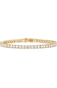 Description The ultimate classic. This timeless, beautiful, elevated tennis bracelet is a necessity for every woman's jewelry box. The perfect statement bracelet that can be worn every day or stacked with other pieces. Materials 14K yellow gold, rose gold or white gold plated AAAAA Cubic Zirconia Stone size: 3mm Sizes: 6.5"; 7"; 7.5" Hypoallergenic; nickel, lead, and cadmium free Tennis Bracelet Gold, Gold Tennis Bracelet, Dainty Wedding, Gold Bracelet For Women, Gold Bracelets, Elegant Bracelet, Stackable Bracelets, Watches Women Fashion, Tennis Bracelet Diamond