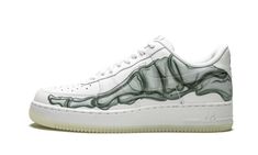 The Nike Air Force 1 Low “Skeleton” is a festive release for Halloween 2018.  The iconic white-on-white Air Force 1 Low received a spooky update for Halloween with a skeletal foot graphic printed across both sides of the upper and on each insole.  The traditional Nike logo on the tongue is also remodeled with bones spelling out the brand name.  For one last special touch, the outsole is featured in glow in the dark rubber.  The frighteningly fresh Air Force 1 Low “Skeleton” appropriately release Buy Nike Shoes, White Air Force 1, Air Force 1 Sneakers, White Air Forces, Custom Shoes Diy, Custom Nike Shoes, Shoes Diy, Custom Nike, Nike Air Force 1 07