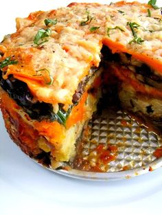 a vegetable tortilla is cut in half on a plate with the words winter vegetable tortilla above it