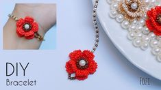 the bracelet is decorated with beads and flowers on it's side, along with pearls