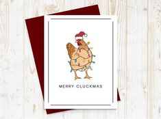 a christmas card with an image of a chicken wearing a santa hat on it's head