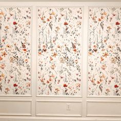 three floral wallpapers in a room with white walls