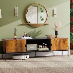 a living room scene with focus on the sideboard and wall mirror in the background