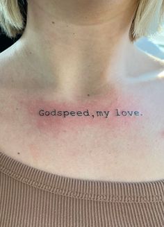 a woman's chest with the words, god speed my love written on it