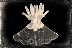 an image of two hands that are in the shape of a hand on a black background