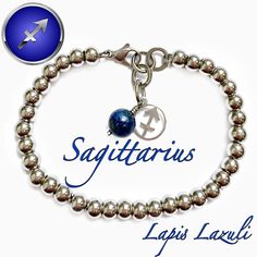 a silver bracelet with a blue ball and the name sagittarius on it