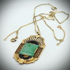 REDUCED! $100 DISCOUNT ON THIS BEAUTIFUL ITEM  (ask for the code) Important: A description is available following the details. Please, read on. Thank you: DETAILS: Material: 14K solid gold, 18K solid gold, green jadeite, black onyx Size:       Pendant: 2 1/4" x 1 1/16"    Chain: 20" + 2" (security chain in 18K solid gold) Weight: 14.29g Period: Ca.  1930's Art Déco Style: necklace, pendant Provenance: an estate sale Additional remarks: the pendant and the chain are stamped with the official 14K solid gold symbol (the shell). The small security chain is in solid 18K gold. N.b.: We guarantee the authenticity of our items. Each one of them has been evaluated by our experts and checked by our competent jeweler. DESCRIPTION: This is a very large and heavy pendant with all the attributes of a pi Midwest Art, Gold Symbol, Fine Gold Jewelry, Art Deco Pendant, Italian Jewelry, Art Objects, Style Necklace, Pure Gold, Estate Jewelry